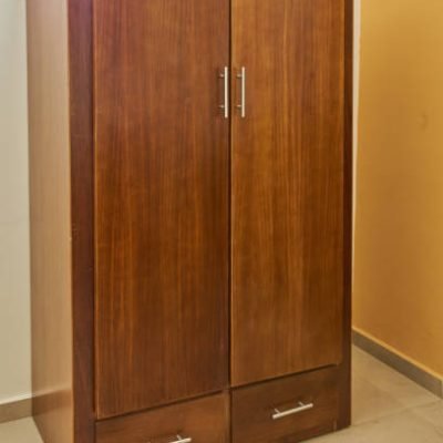 Wardrobe for storing wooden clothes inside a hotel room
